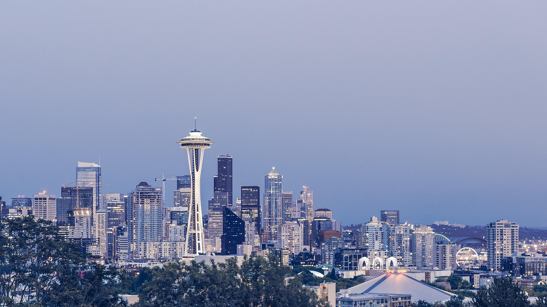 A gloomy Seattle skyline, Ken's stomping grounds, with the Space Needle rising above the city.